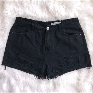 High-rise “Kylie” Distressed Jean Shorts